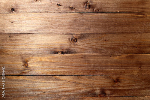 Texture of a wooden plank lying along