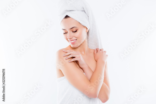Portrait of tender sensual girl after shower with turban on head