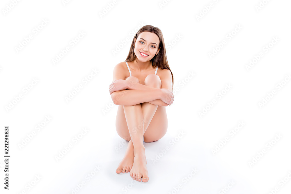 Portrait of slender seductive woman sitting over white backgroun Portrait of slender seductive woman sitting over white backgroun