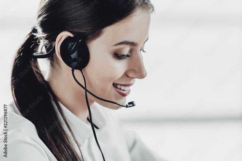 beautiful female call center worker with headphones beautiful female call center worker with headphones