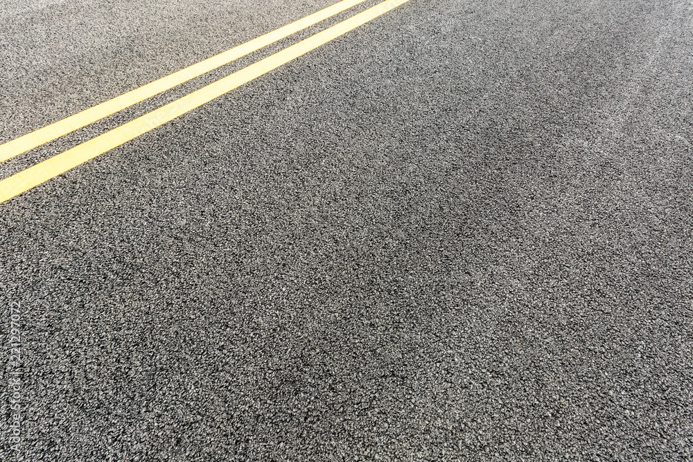 Fototapeta premium Black asphalt road,background texture close-up