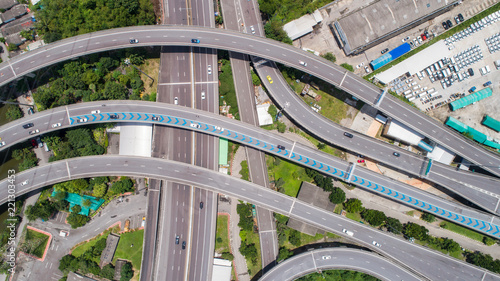 Aerial view highway road network connection or intersection for transportation concept.