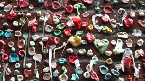Used bubblegums hang on the wall