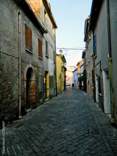 Italian street in old city, Rimini, Italy. Europe. Nooks and crannies in the Rimini. Narrow Alley With Old Buildings In Typical Italian Medieval Town