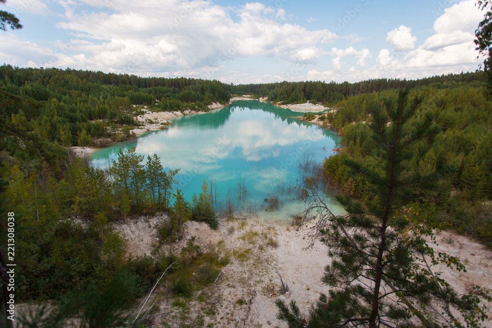 Naklejka premium blue pond in the pine forest, Kyshtym, Russia