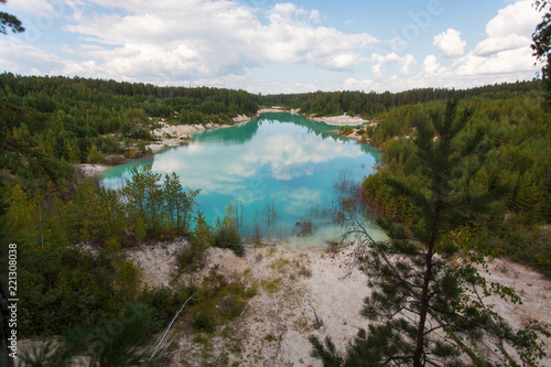 blue pond in the pine forest, Kyshtym, Russia