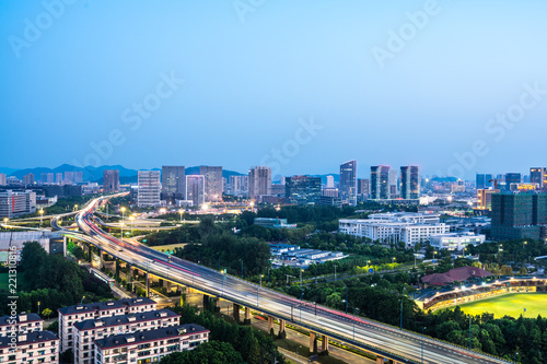 busy traffic road with city skyline in hangzhou china © THINK b