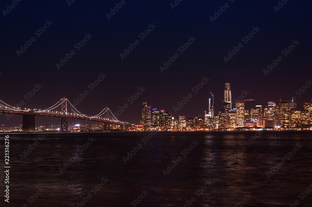 San Francisco, CA - view of the city and bay at night	