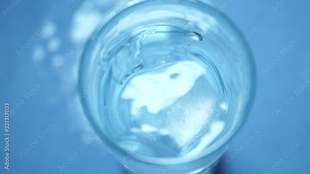 Stirring water slowly in a glass Stirring water slowly in a glass