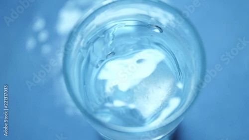 Wallpaper Mural Stirring water slowly in a glass  Torontodigital.ca