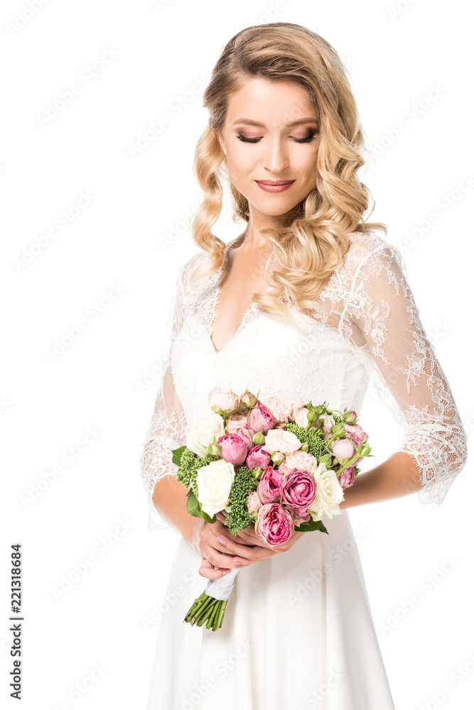 attractive young bride with bouquet isolated on white