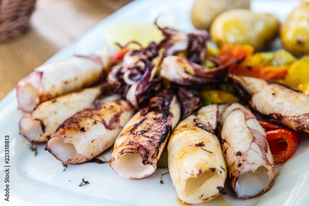 Mediterranean Octopus with vegetables and potatoes Mediterranean Octopus with vegetables and potatoes