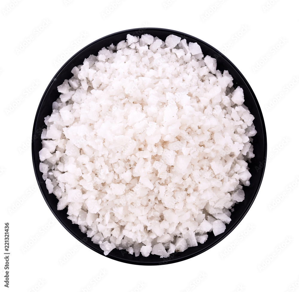 Sea salt in bowl on white background Sea salt in bowl on white background