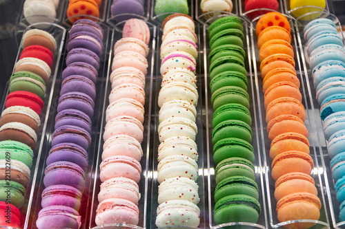 French macaron dessert, lots of colorful macarons in the pastry shop window in Paris