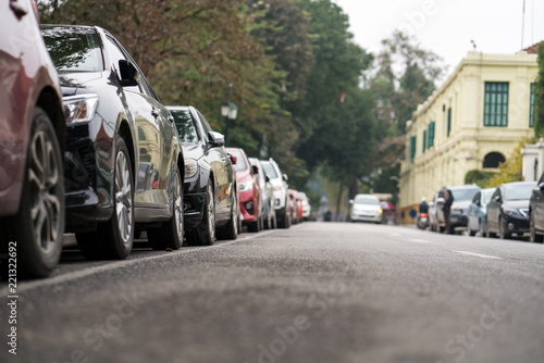 Cars parked on the urban street side