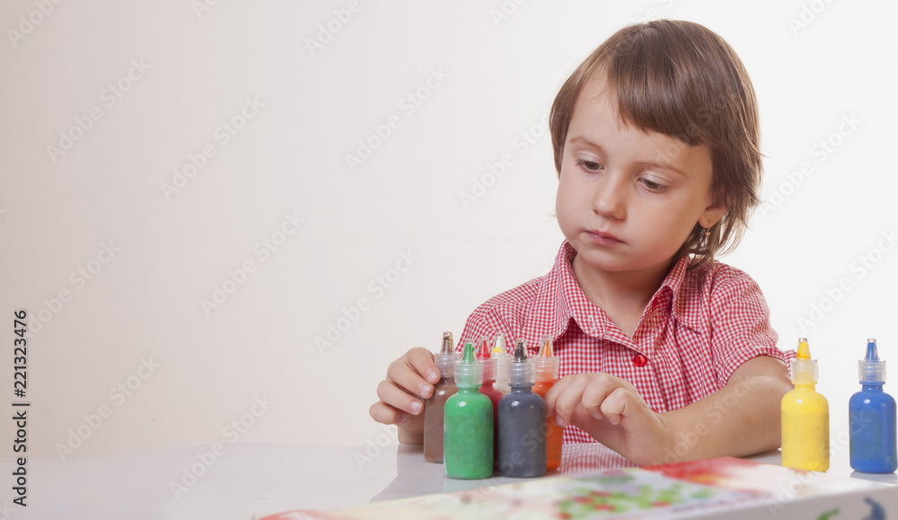 Cute happy child girl is ready to painting. (Creativity, education, child development in art, childhood concept) Cute happy child girl is ready to painting. (Creativity, education, child development in art, childhood concept)
