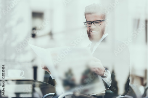 Serious Businessman Reading Newspaper Cafe Outdoor