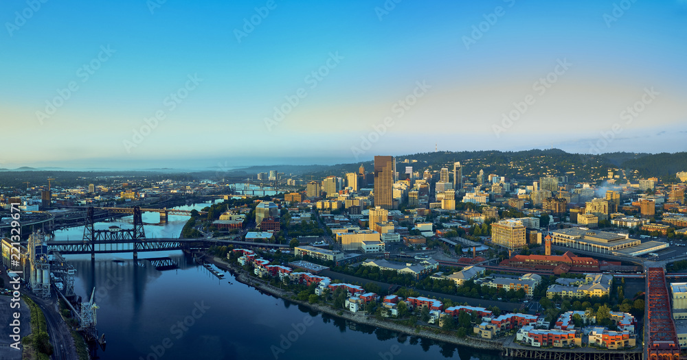 Drone aerial panorama sunrise over downtown Portland with 6 bridges and the Willamette River