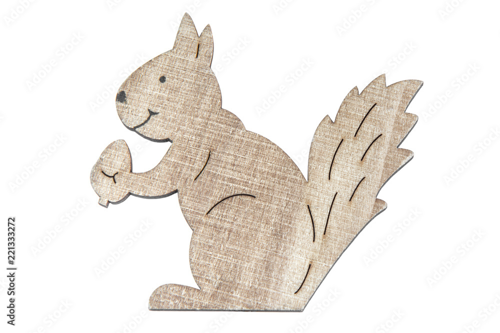 Close up wooden decoration of a squirrel isolated on a white background. Close up wooden decoration of a squirrel isolated on a white background.