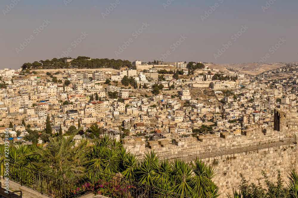 View from the old city walls on East-Jerusalem and a part of the Mount of Olives. Israel