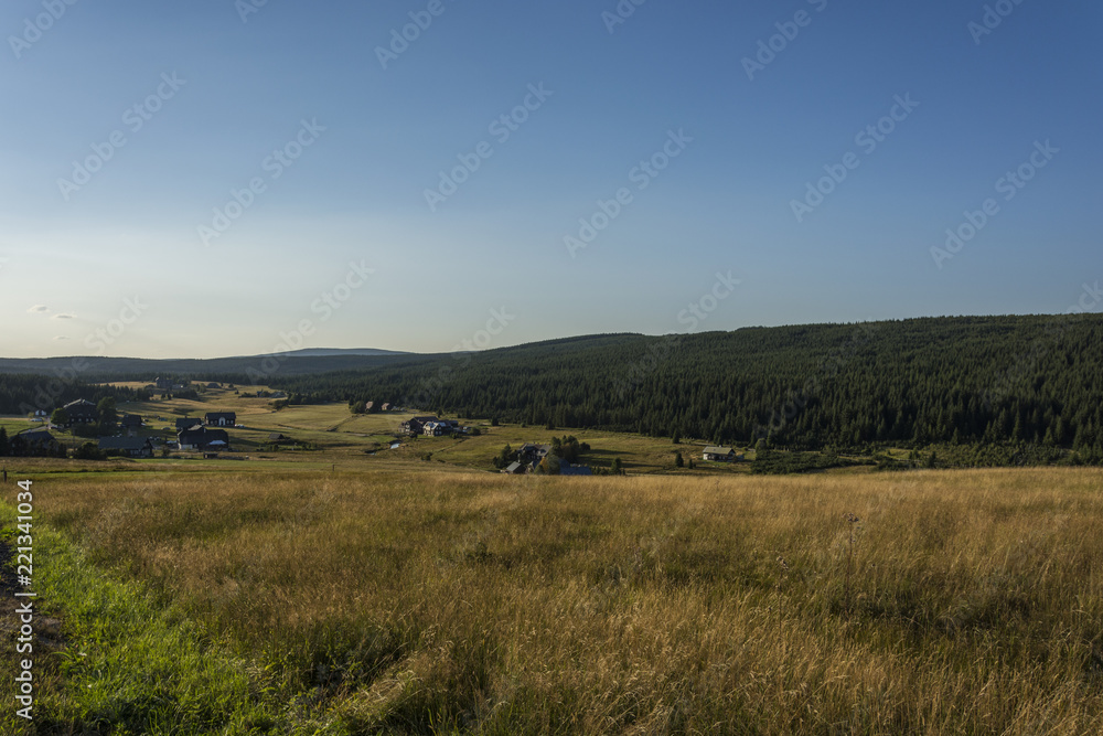 Evening view on the mountain landscape with the dominant hill. The area 