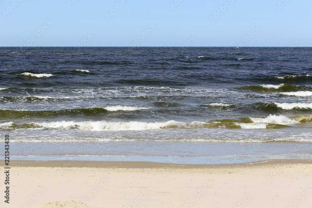 Sea waves by the shore in Kolobrzeg
