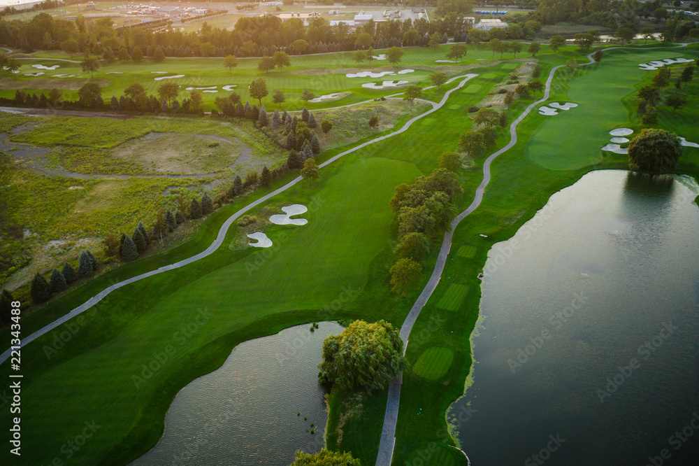 AERIAL OF GOLF COURSE SUNSET