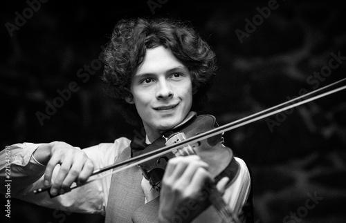 young handsome violinist. black and white.