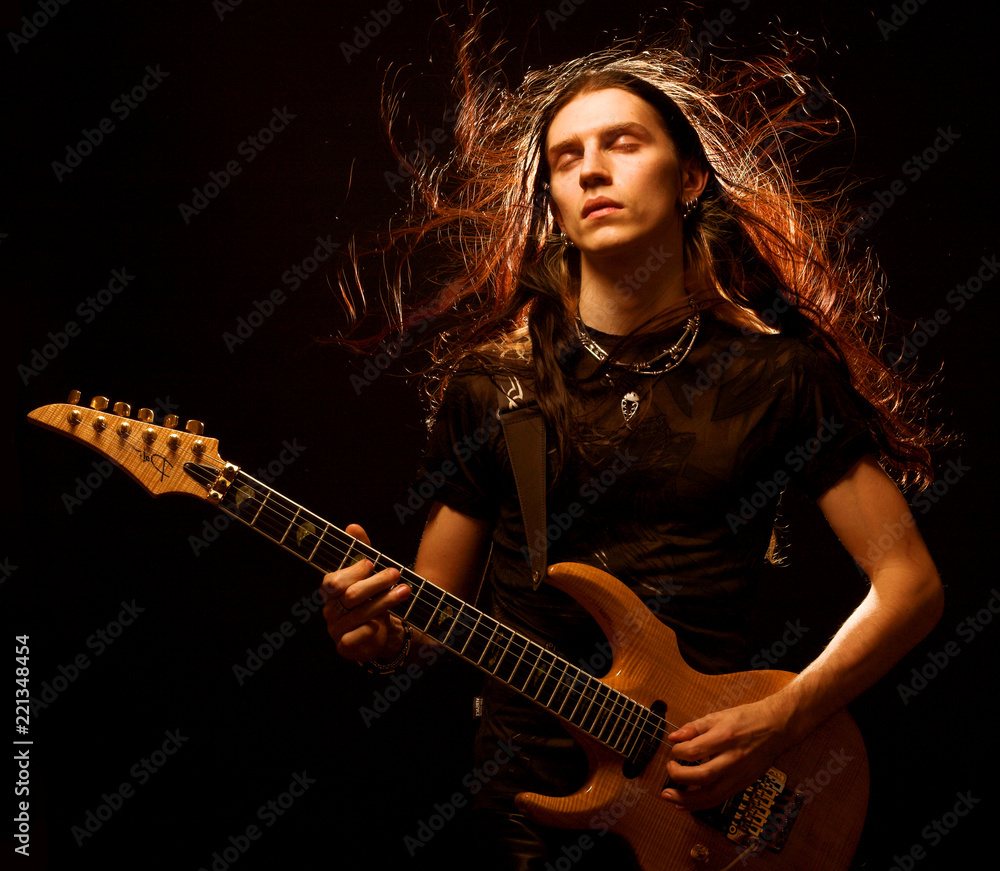 man playing electrical guitar man playing electrical guitar