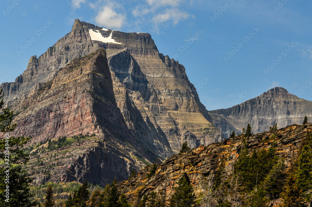 A Lonely Patch of Late Summer Snow on a High Mountain Ridge in Montana's Glacier National Park