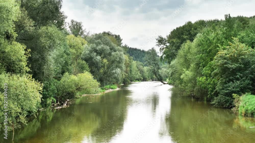 Tilt down (and up) to the river Erlauf in Austria in UHD resolution Tilt down (and up) to the river Erlauf in Austria in UHD resolution