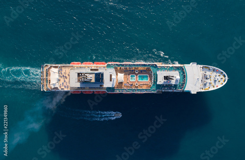 Tourist ship in the blue sea, aerial view