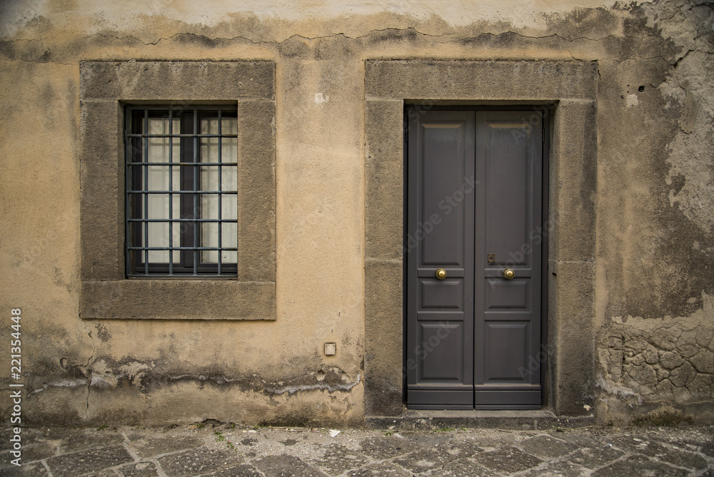 Fototapeta premium an Old italian vintage door and window