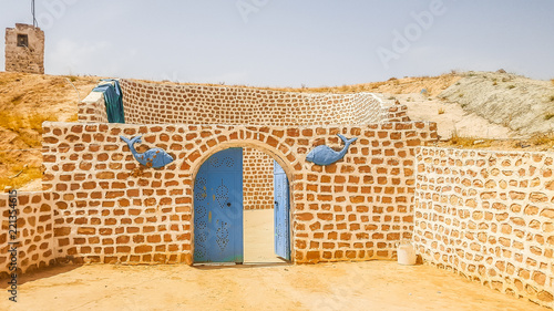 Matmata, Tunisia, July 02, 2018: Traditional underground house of local residents - the Berbers, called troglodytes. photo