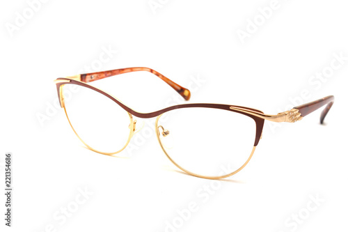 Golden sunglasses with open shackle on white background