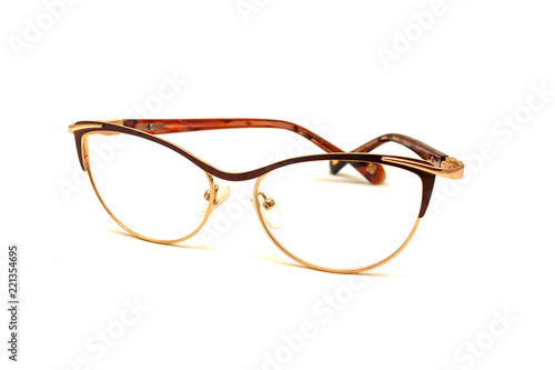 Golden sunglasses with closed shackle on white background