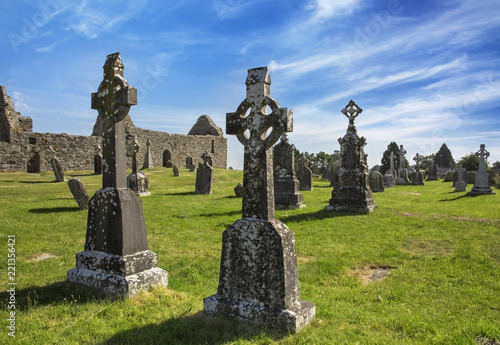 Clonmacnoise Cathedral  with the typical crosses and graves photo