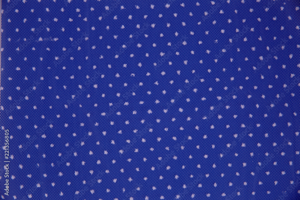 Blue fabric with white polka dots. Blue fabric with white polka dots.