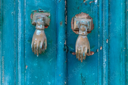 old door handle in the form of a woman's hand