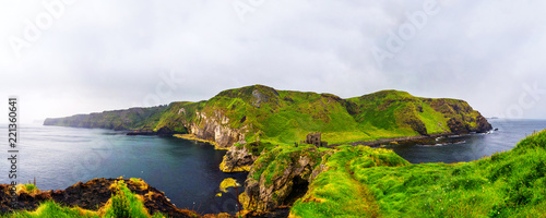 Panoramic view of a Causeway coast and gents with Kinbane castle and sea photo