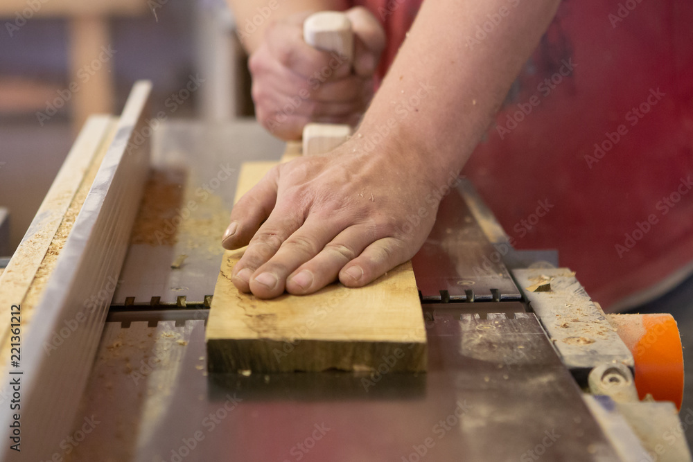 Manual manufacturing of furniture from a natural tree in a workshop. Manual manufacturing of furniture from a natural tree in a workshop.