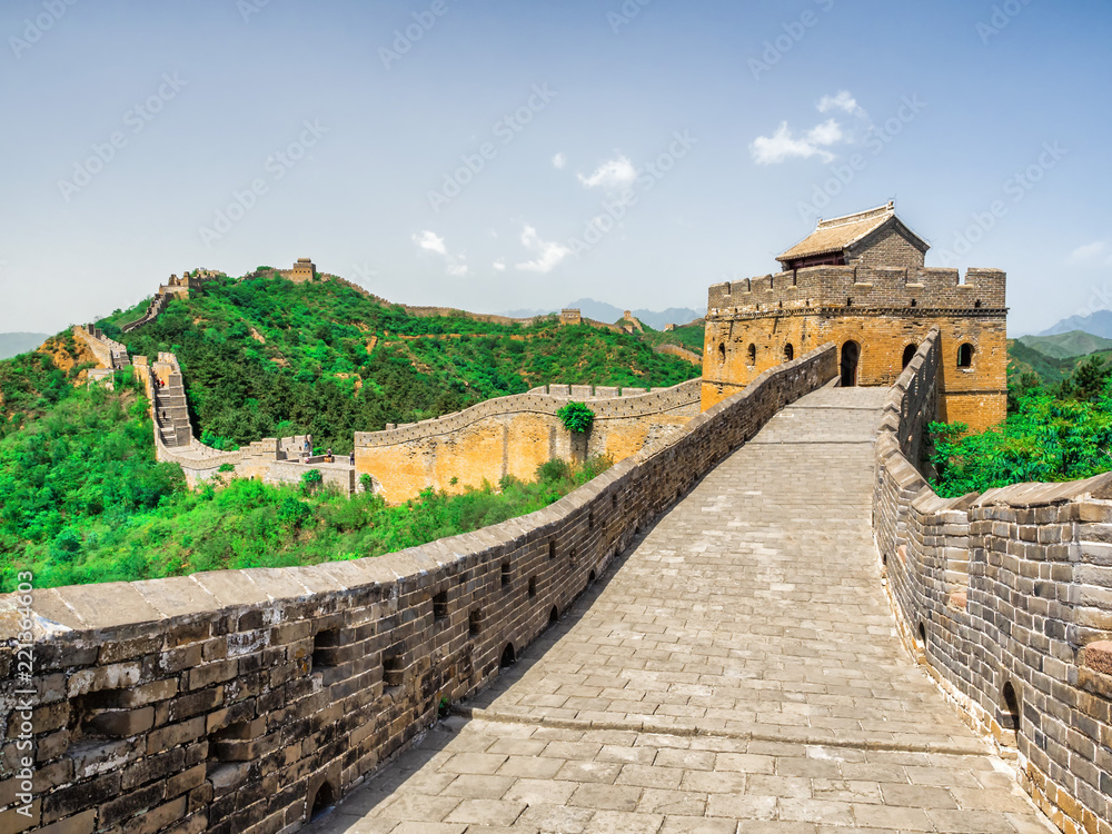 The Great Wall Jinshanling section with green trees in a sunny day, Beijing, China