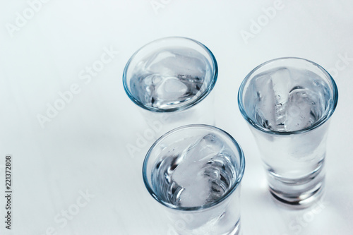 Wallpaper Mural Vodka shots with ice on a white background Torontodigital.ca