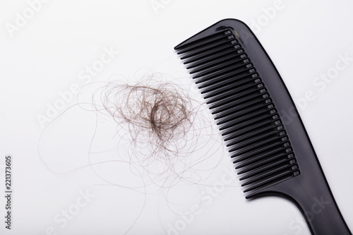 Black Comb With Hair Loss