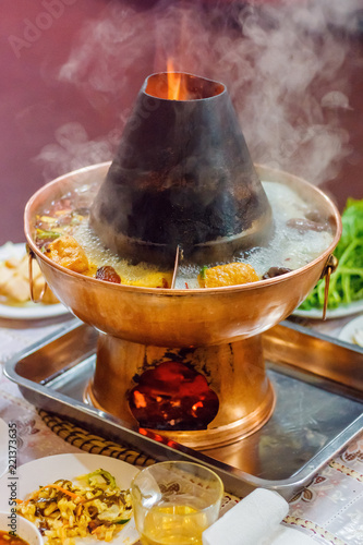 Asian traditional double flavor hot pot close-up