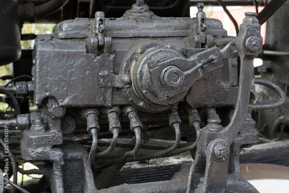 Bigger details on the old steam locomotive. Heavy iron parts. Locomotive in parts. Close-up