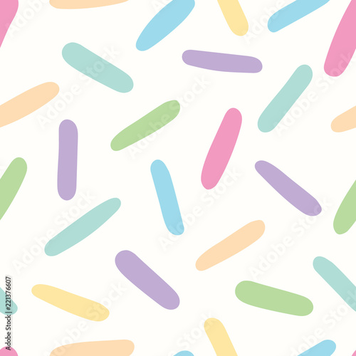 Seamless Pattern of Rainbow Colored Candy Sprinkles.