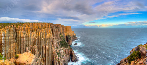 Εκτύπωση καμβά The sun hitting the top of the cliffs at Cape Raoul