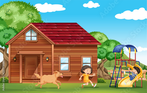 Children playing outside with dog