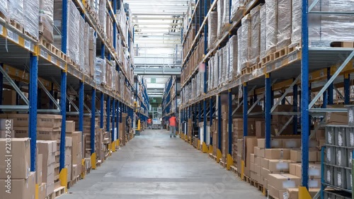 Wallpaper Mural Time-lapse clip of busy workers in a warehouse or factory Torontodigital.ca